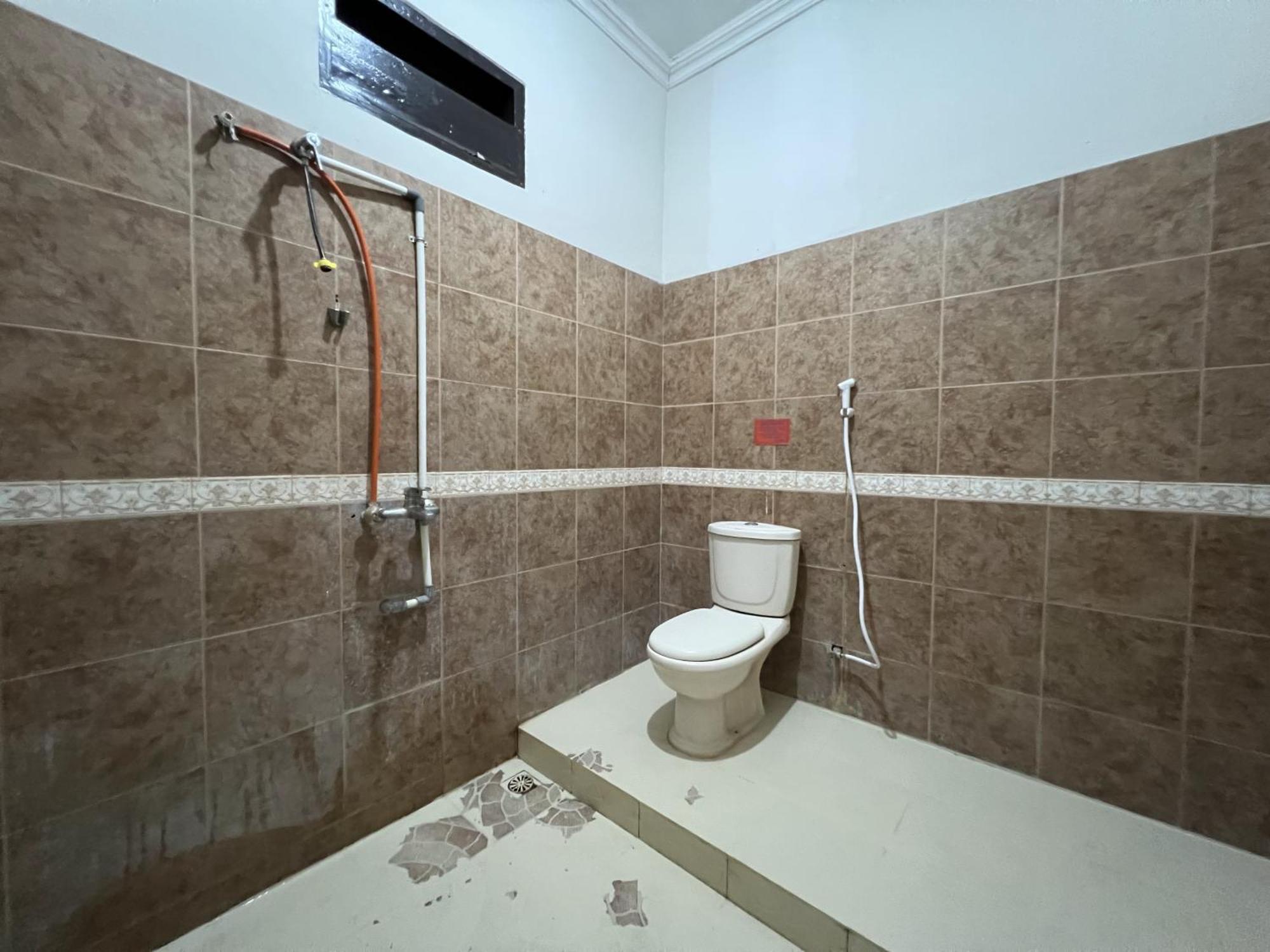 Hotel Oyo 92098 Kost Orange Syariah Makassar Esterno foto